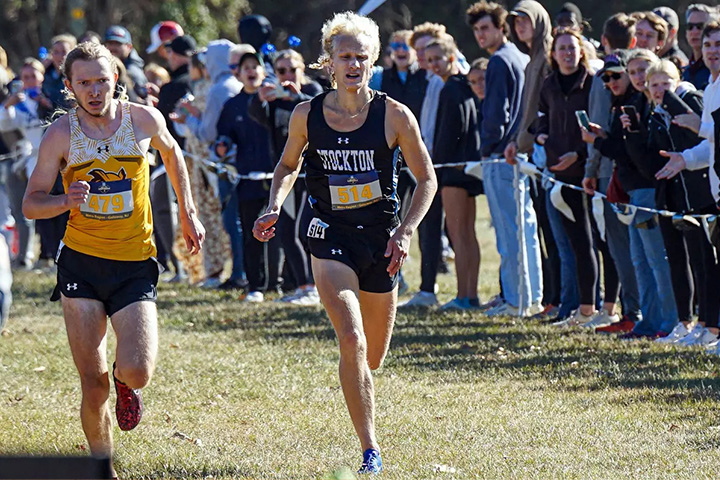 Two track and field athletes running in a race