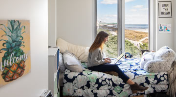 Student with a scenic view from their dorm in Atlantic City