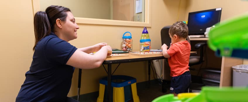 student assisting a child