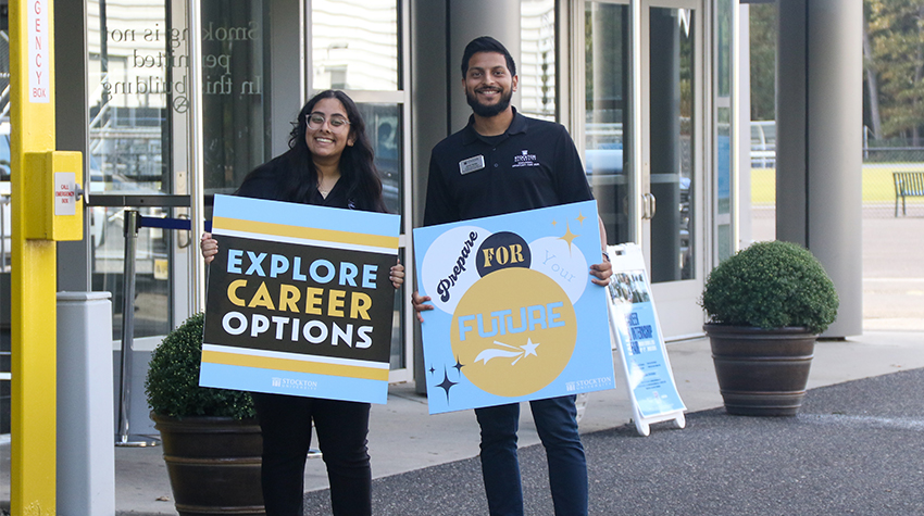 Priya Parikh, head TALON, and Jamal Ahktar, EOF, outside of Big Blue during the Career Fair 