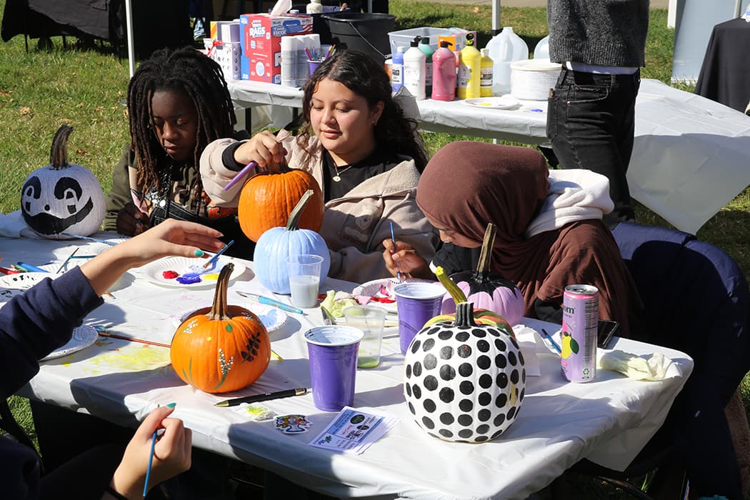 pumpkin decorating at party in the park