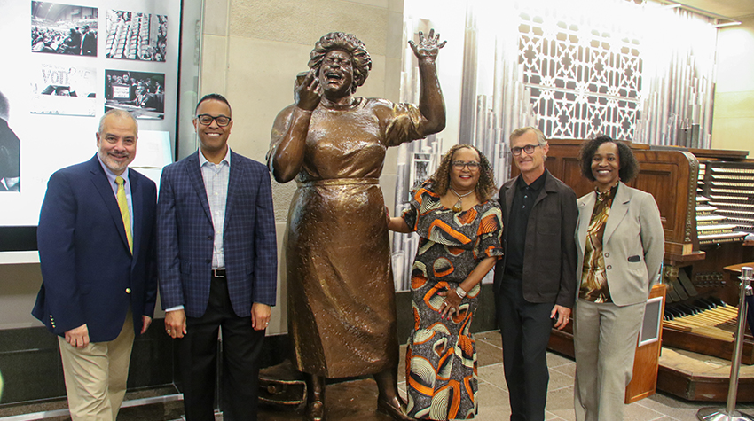 From left, Stockton President Joe Bertolino; Brian Jackson, chief operating officer of Stockton’s Atlantic City campus; Patricia Reid-Merritt, Stockton Distinguished Professor of Africana Studies and Social Work; Brian Hanlon, sculptor of the statue; and Donnetrice Allison, professor of Africana Studies and Communication Studies.