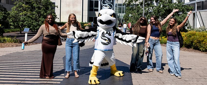 students and Talon outside