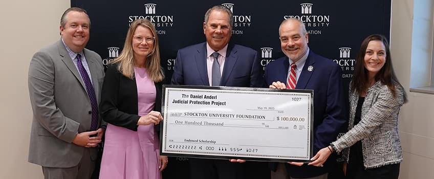 Daniel Anderl donation check presentation 