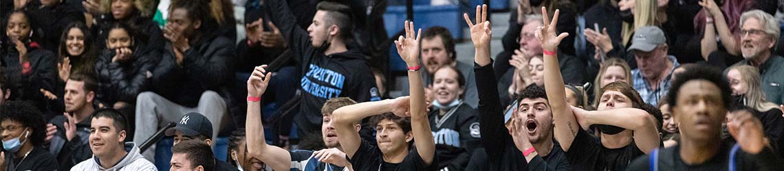 A crowd of Osprey fans cheer during the NCAA tournament